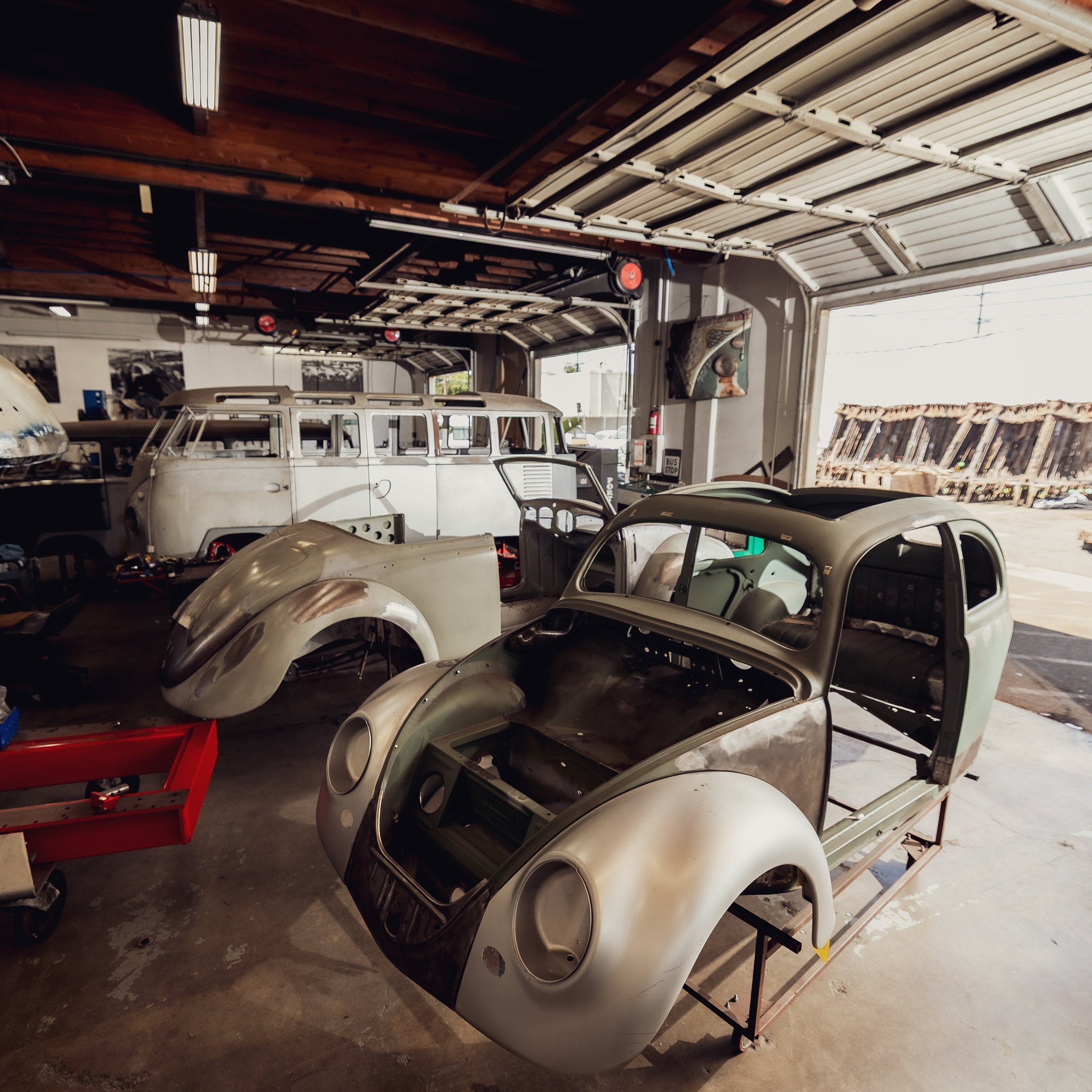 Bare-metal VW Beetle body mid-restoration at Washburn's Metal, Orange CA