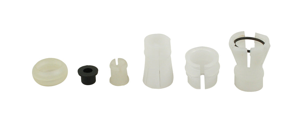 EMPI 98-7096-B VW Bus shift rod bushing kit, plastic bushing pieces laid out in a row, for Type 2 1954-1979