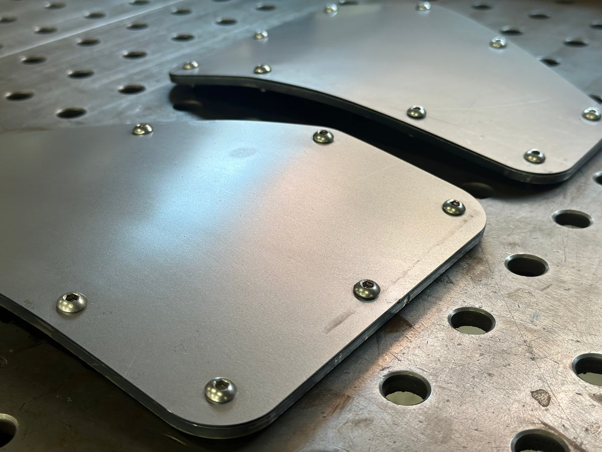 Dual Weber IDF carburetors visible through Washburn Windows access panels in Beetle engine bay