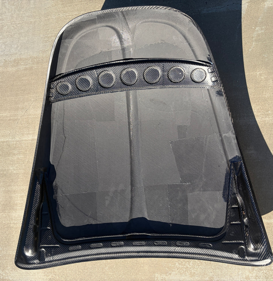 Underside of the carbon fiber VW Super Beetle front hood showing the reinforced carbon inner frame (#HOOD-CF)