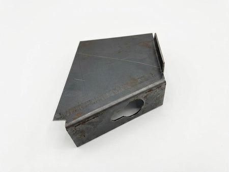 Split window VW Bus frame patch panel near heater tube crossmember, angled view