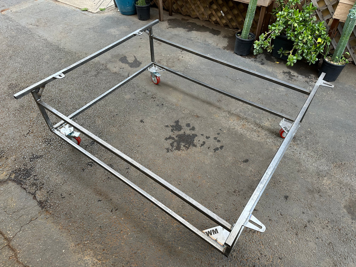 Body cart with VW Beetle pan and body separated for chassis work