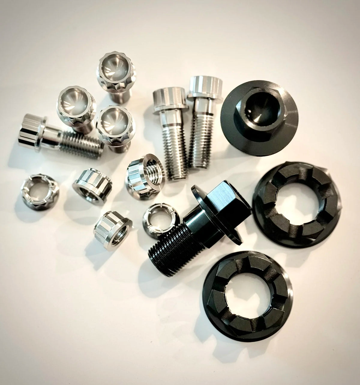 King Performance VW titanium trans kit with PVD axle nuts, M18 x 1.5 horn bolts and 12-point spring plate bolts and nuts for Beetle and Ghia IRS